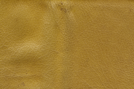 黄土色に染められたレザーのテクスチャ素材